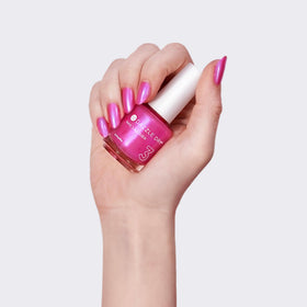 Dazzle Dry nail swatch on hand showing wearable hot pink shine and long-wear benefit