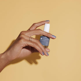 Dazzle Dry Blue Moon applied on model nails demonstrating salon-quality wear and shine