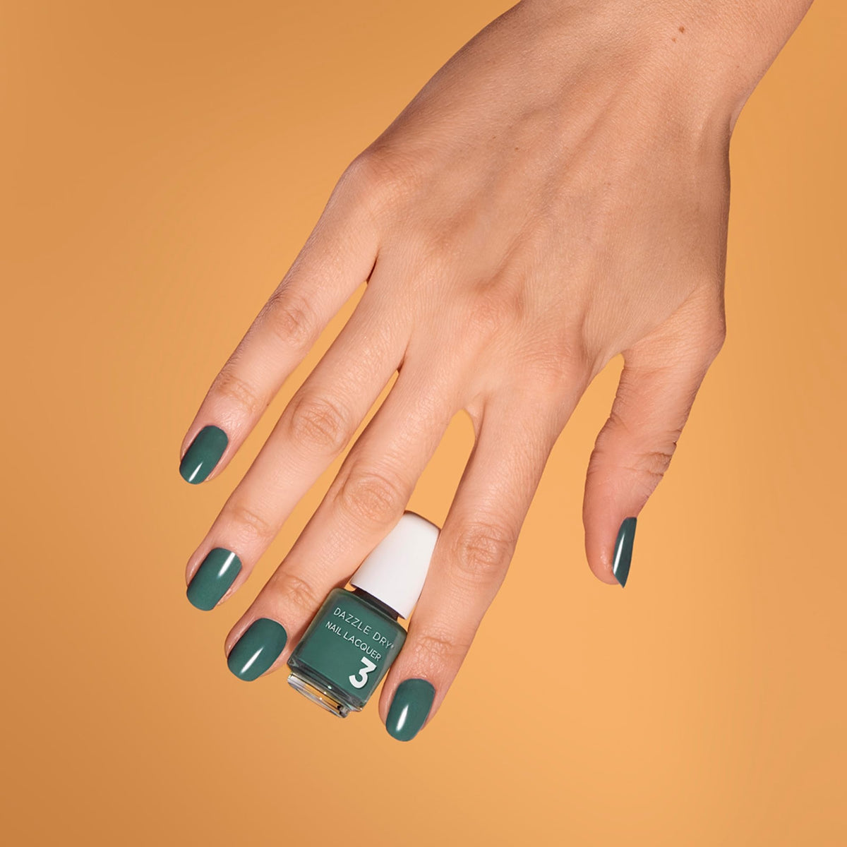 Dazzle Dry Creamsicle Sorbet stroke on nail wheel showing true shade preview benefit