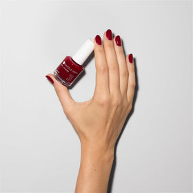 Dazzle Dry lacquer being applied on natural nails demonstrating fast-dry performance