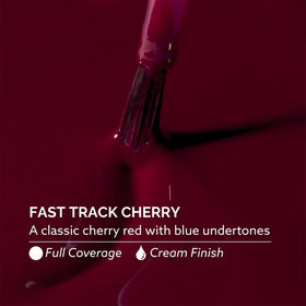Dazzle Dry swatch of Fast Track Cherry on skin showing true cherry red with blue undertone