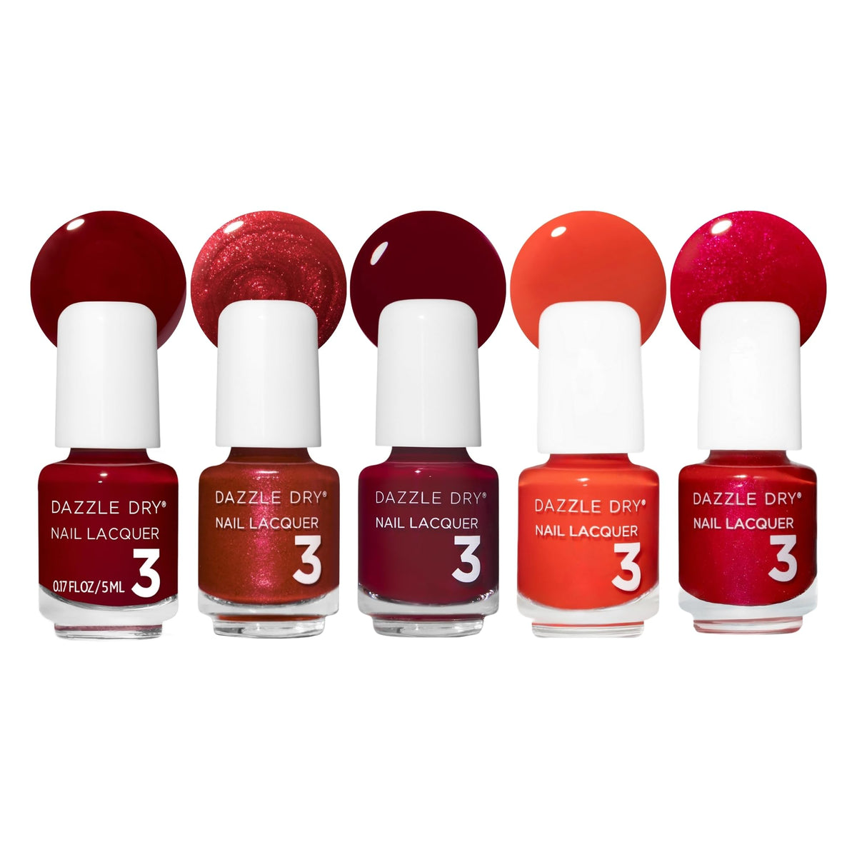 Dazzle Dry front packaging showing five mini red lacquers and compact case benefit travel-ready