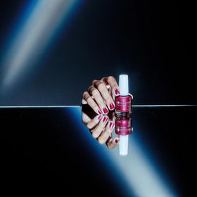 Dazzle Dry hand model wearing Kaleidoscope showing salon-quality, long-wear finish