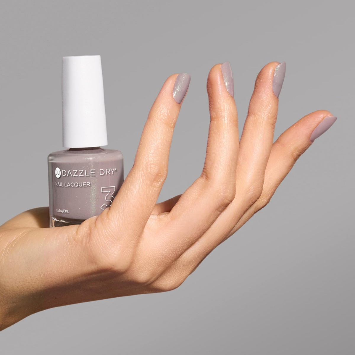 Dazzle Dry nail swatch on hand showing wearable color benefit