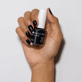 Dazzle Dry lacquer applied on natural nails showing salon finish and durability benefit