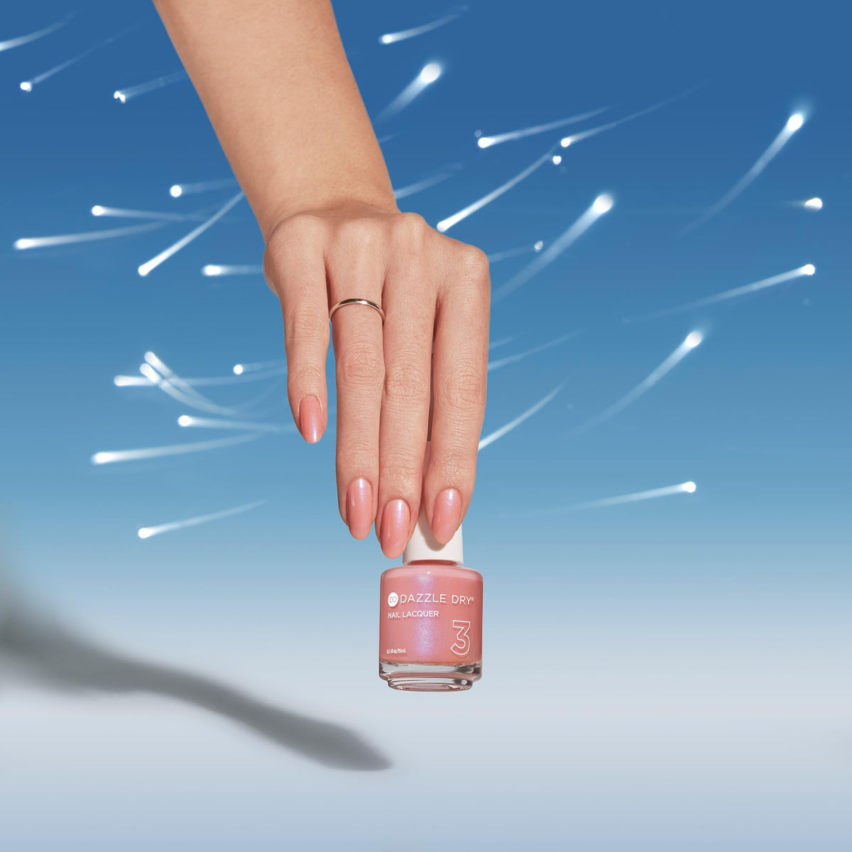 Dazzle Dry Milky Way applied on natural nails showcasing elegant finish