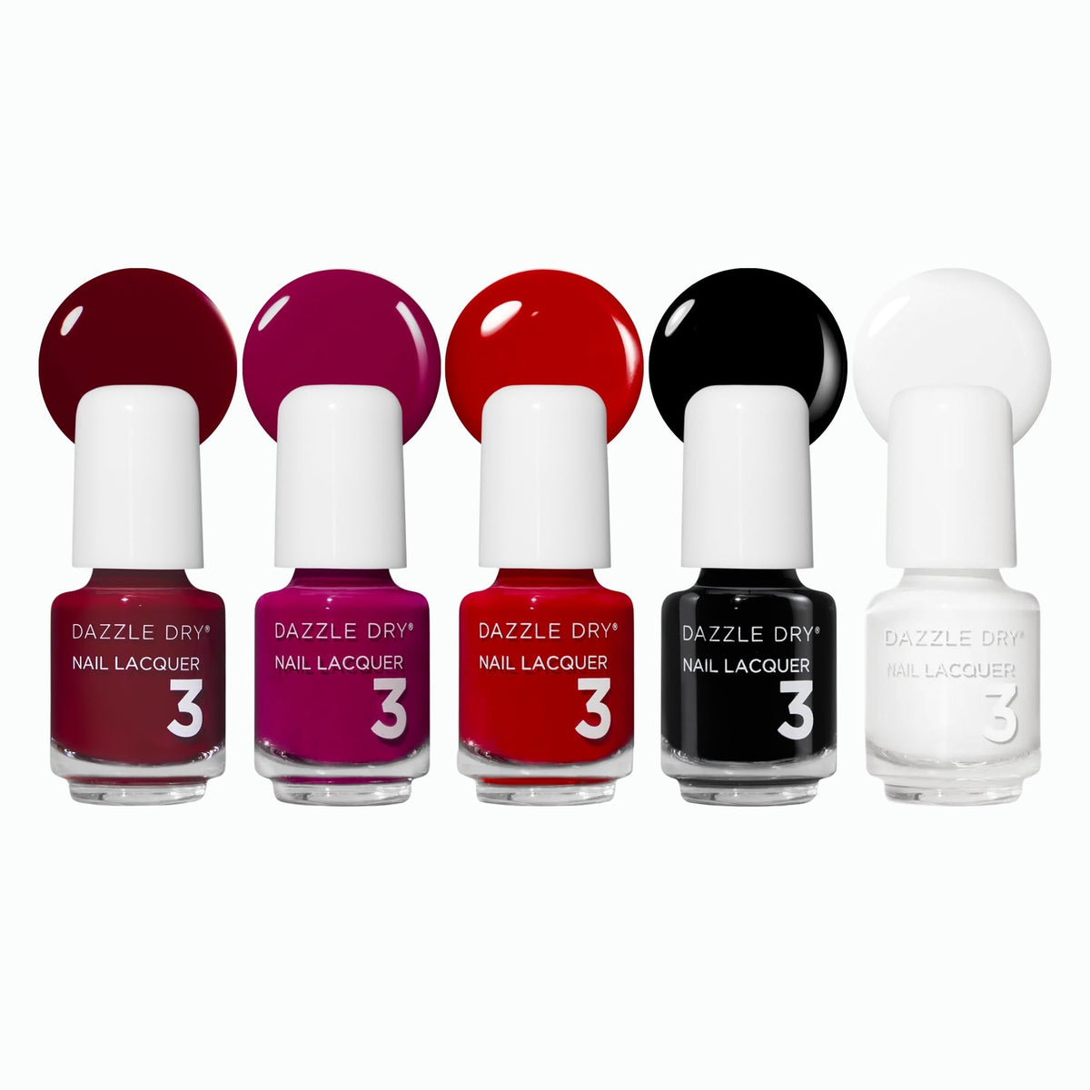 Dazzle Dry front packaging showing five mini lacquer bottles and product name benefit quick-dry