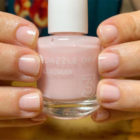 Dazzle Dry lifestyle photo of soft pink manicure using Prima Ballerina for everyday elegance benefit