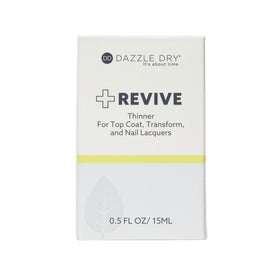 Dazzle Dry Revive bottle next to a ruler for scale and travel-friendly benefit