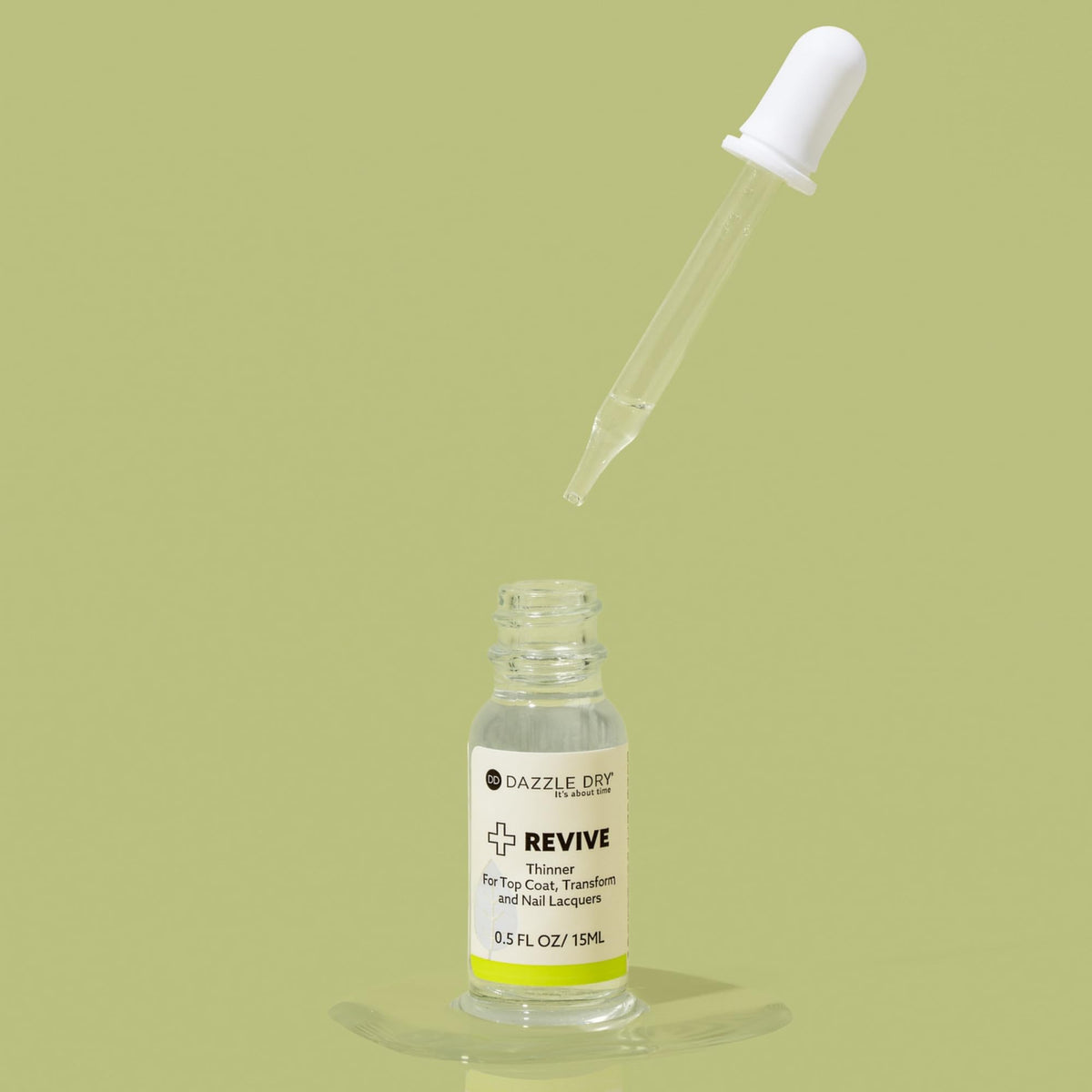 Close-up droplet of Dazzle Dry Revive demonstrating controlled thinning benefit