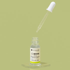 Close-up droplet of Dazzle Dry Revive demonstrating controlled thinning benefit