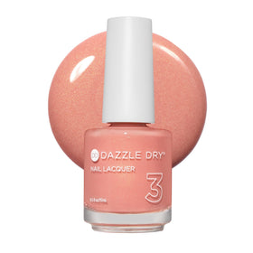 Dazzle Dry front bottle image showing Sunset Glow peach shade and label benefit quick-dry