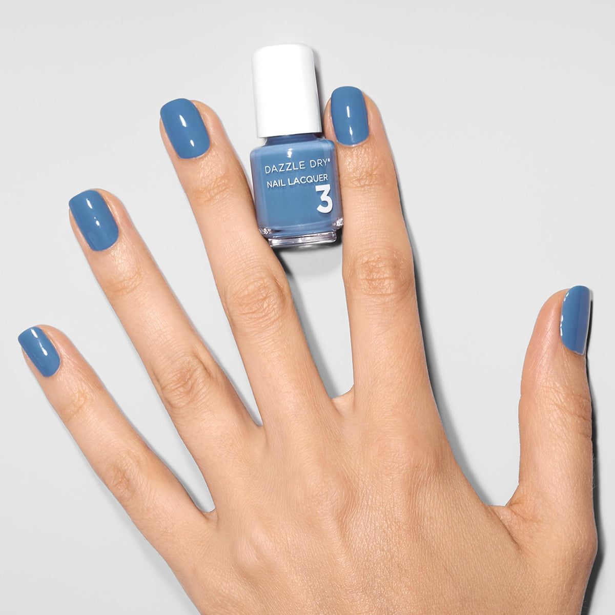 Dazzle Dry top coat brush detail demonstrating even application and quick set