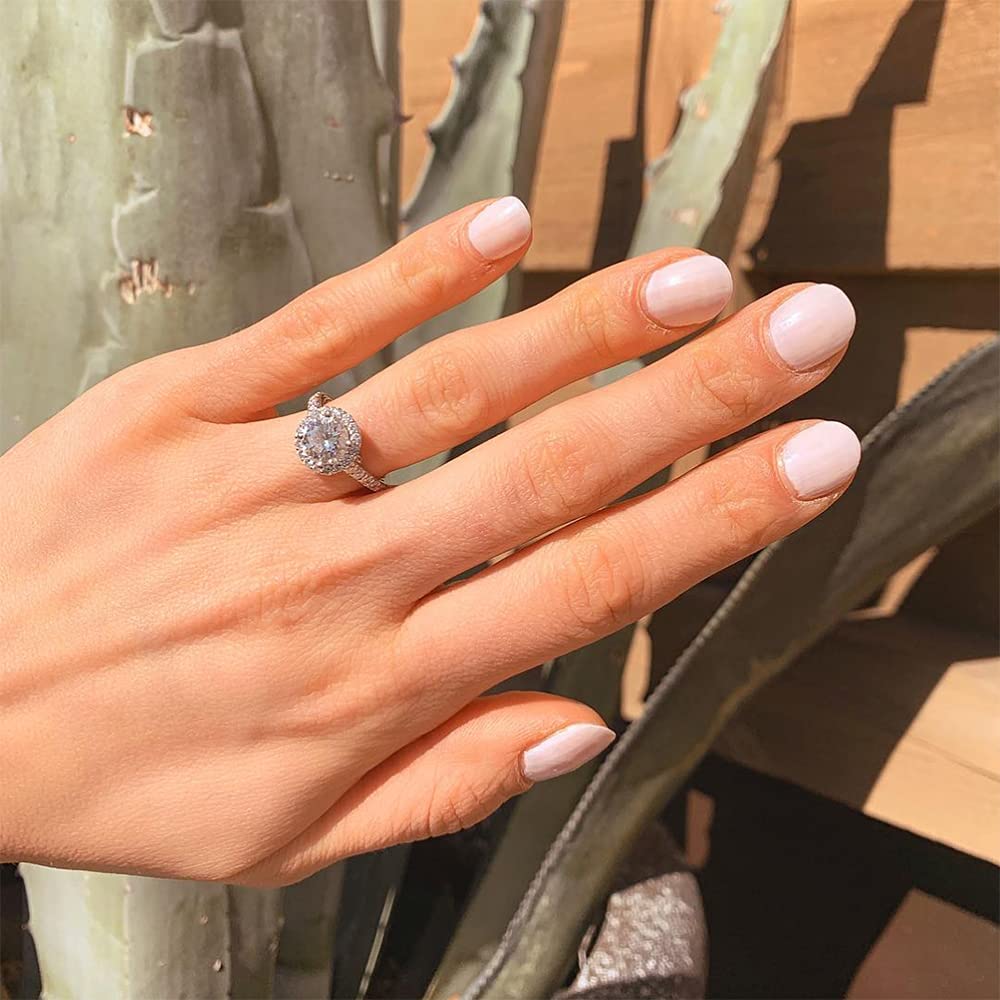 Dazzle Dry manicure lifestyle scene with hands on table, showing quick-dry convenience