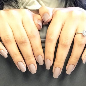 Dazzle Dry application on vanity showing easy at-home five-minute manicure