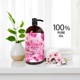 Dead Sea Collection 33.8 fl oz bottle beside measuring glass for scale