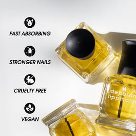 Deborah Lippmann pen held in hand showing size and easy portability for on-the-go care