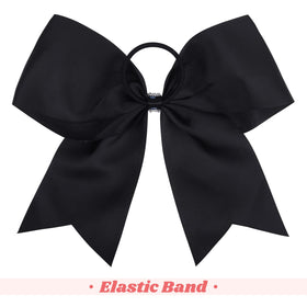 DEEKA cheer bow in ponytail worn during routine highlighting stable fit