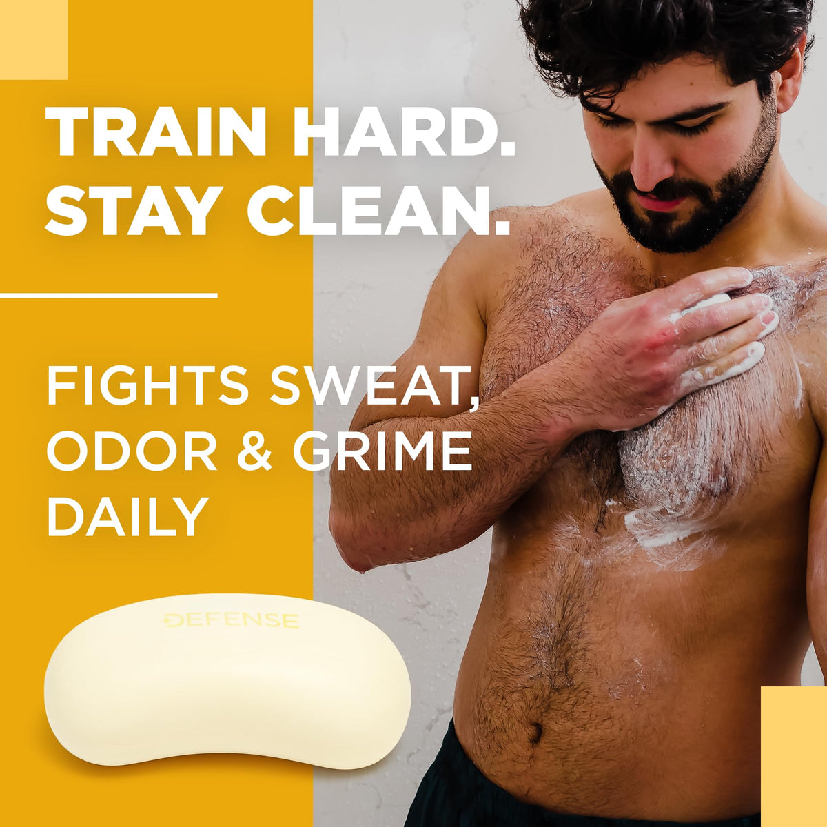 Defense Soap citrus bar held in hand showing real scale and easy grip for gym bag convenience