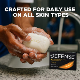 Defense Soap citrus bar close-up of triple-milled texture illustrating long-lasting density and smooth feel