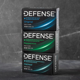 Defense Soap oatmeal bar close-up showing ground oats for gentle exfoliation benefit