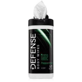 Outdoor camping scene using Defense Soap wipe for freshening up after hiking