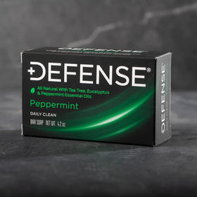 Defense Soap peppermint leaf close-up suggesting cooling, refreshing effect