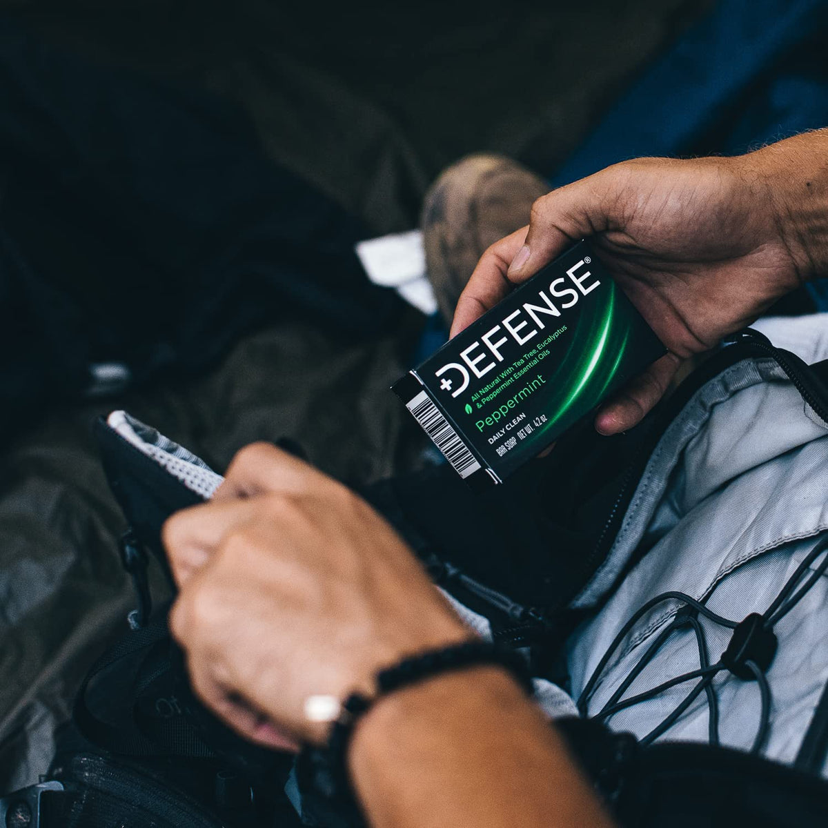 Defense Soap bar in shower with athlete using it for refreshment benefit