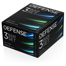 Defense Soap bar held in hand to show full-size 4.2 oz scale and travel-ready benefit
