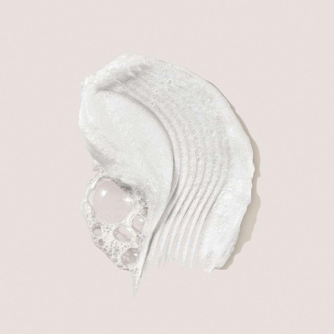 DEINDE microfoam in hand demonstration showing easy lather and gentle cleanse