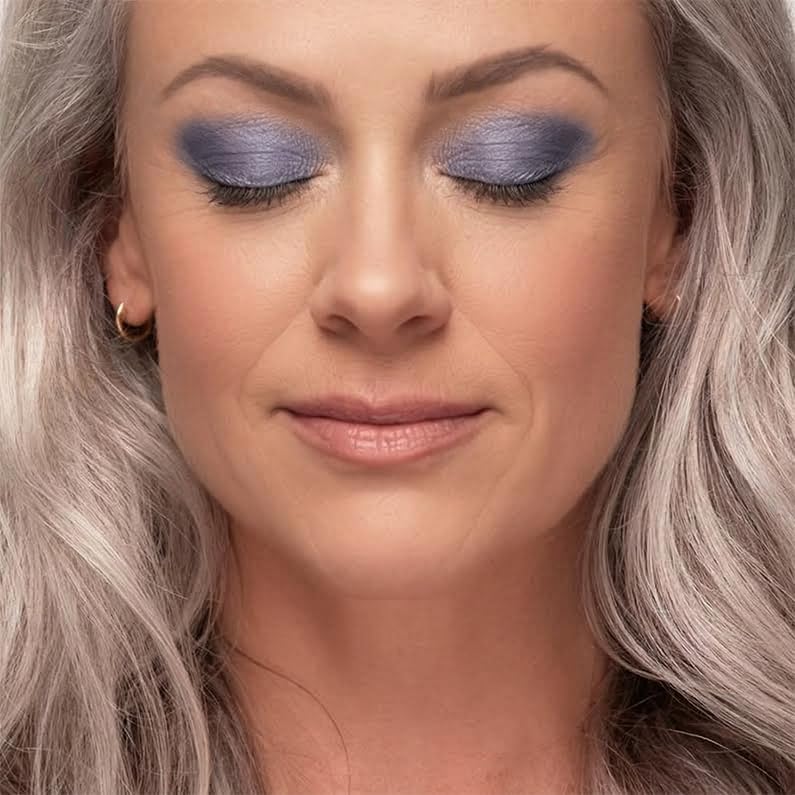 DEMÚRE close-up powder texture revealing fine mineral shimmer for smooth blendability