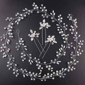 Denifery three silver rhinestone hair pins and vine flatlay for secure fastening