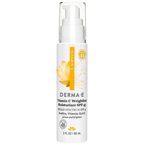 Derma E moisturizer applied on hand showing lightweight coverage