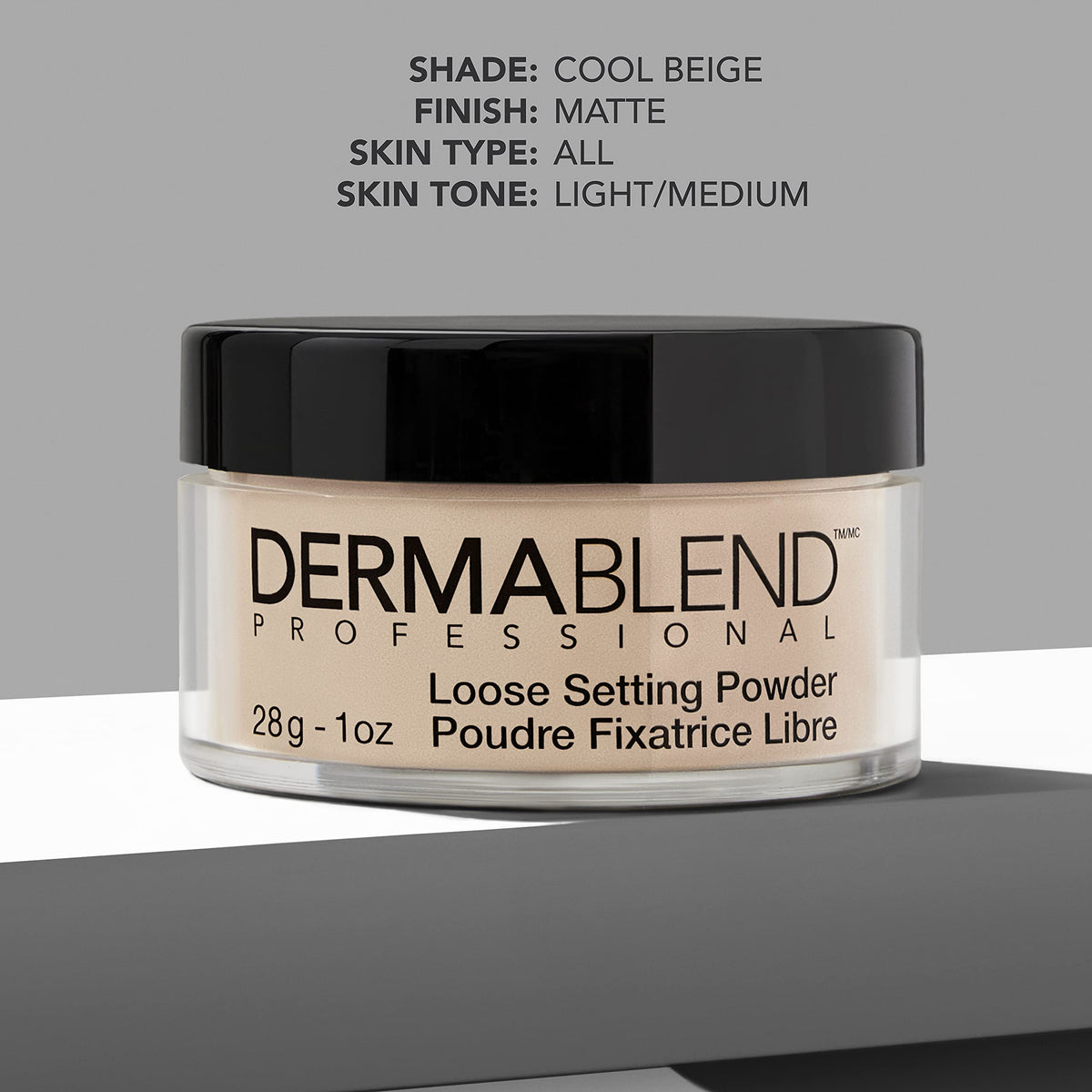 Applying Dermablend powder with brush to mattify skin and set foundation