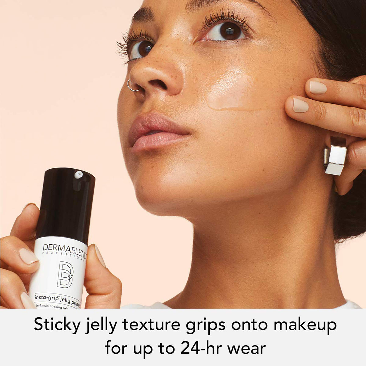 Dermablend primer dabbed on hand demonstrating hydration and smooth finish