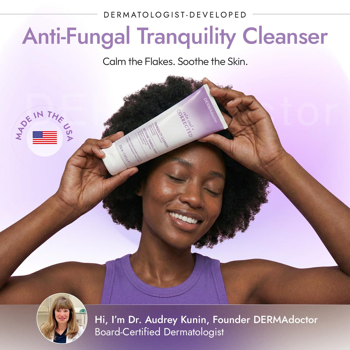 DERMAdoctor using cleanser on face in mirror showing daily routine benefit: gentle facial care