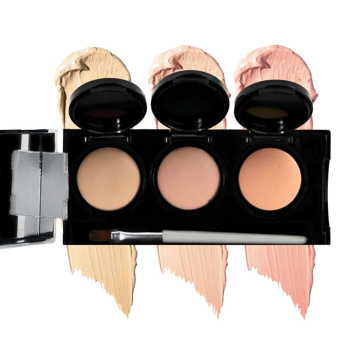 Dermaflage palette open showing three corrective shades and brush for versatile correction