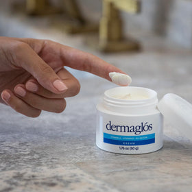 Dermaglós tubes in travel bag showing convenient on-the-go care