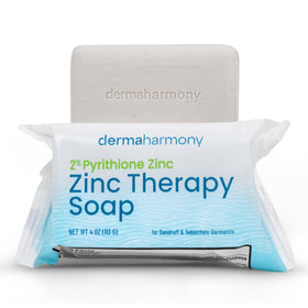 Dermaharmony bar beside coin to show 4 oz size and travel-friendly benefit
