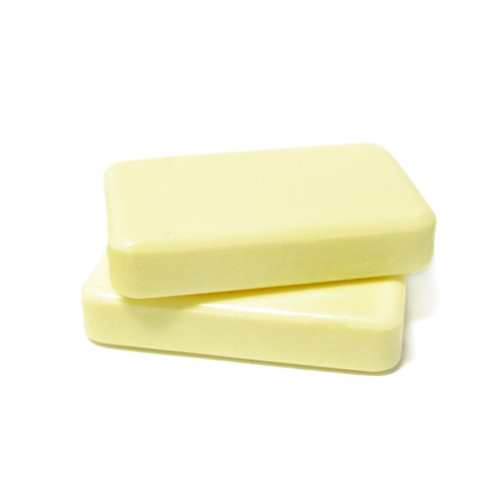 DermaHarmony bar in hand lathering to cleanse and control oil