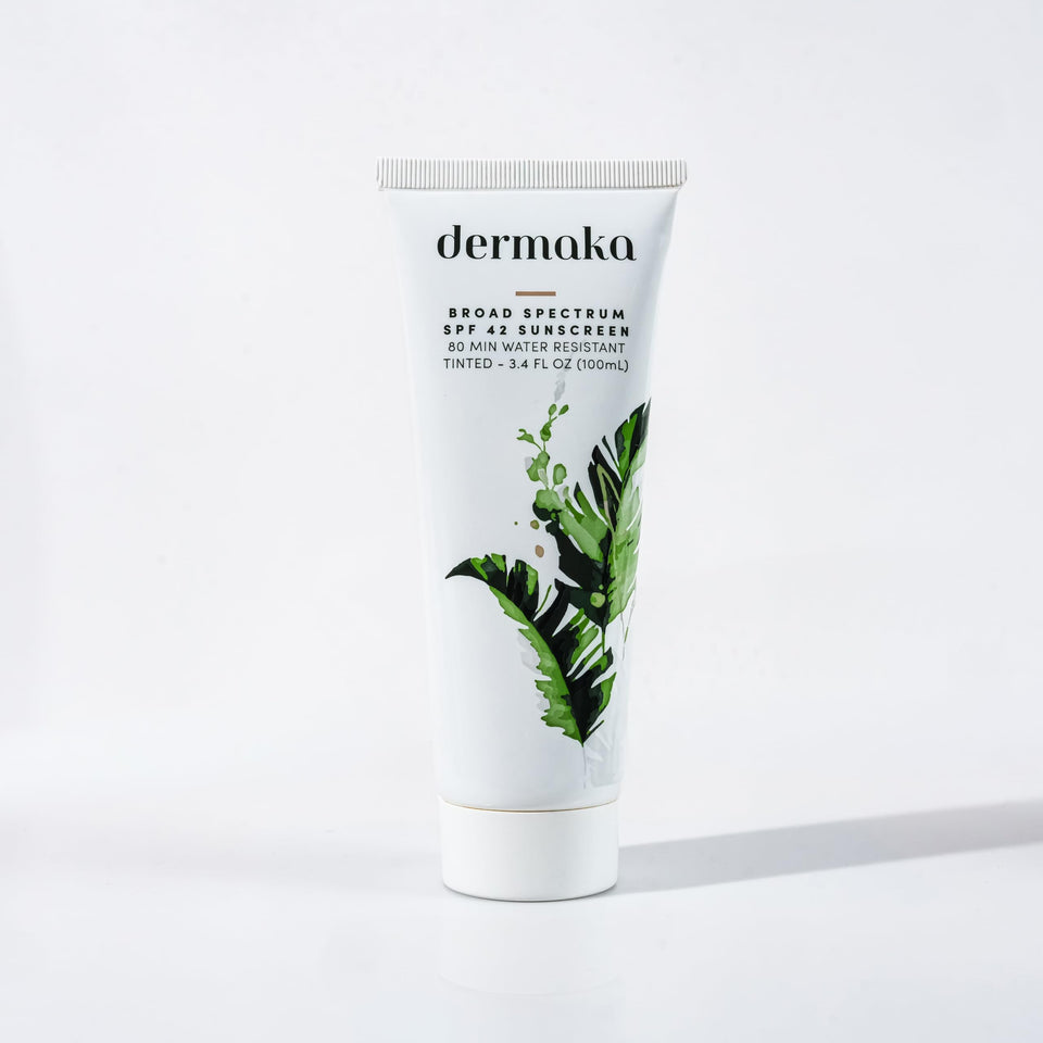 Dermaka front tube showing SPF 42 and tinted face sunscreen benefit