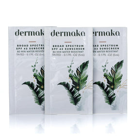 Dermaka sachet open showing sunscreen texture for easy blending