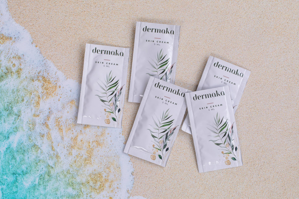 Dermaka packet in hand demonstrating travel-friendly small size