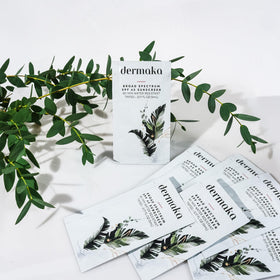 Dermaka sachet beside credit card illustrating compact travel benefit