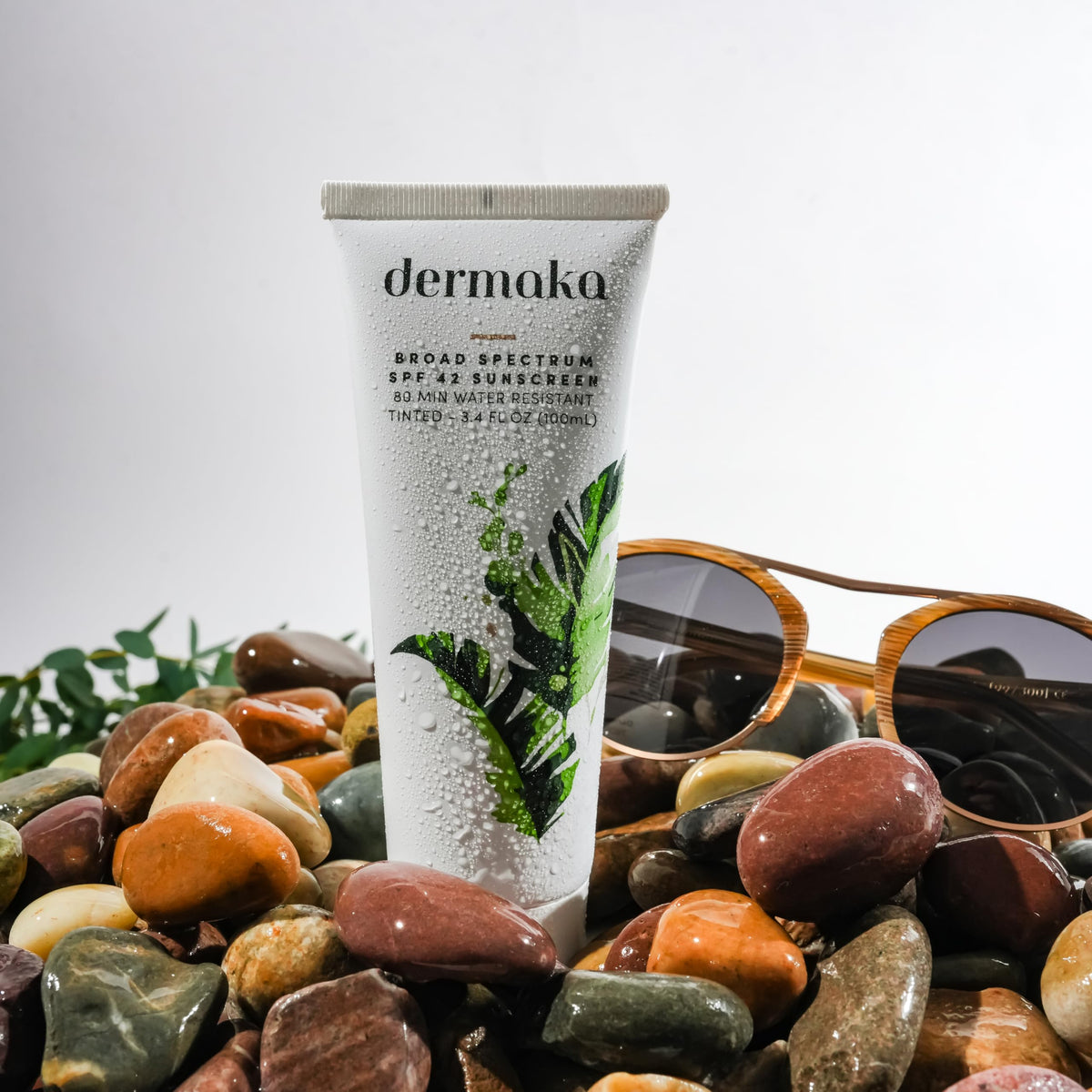 Dermaka tube with water droplets showing 80-minute water resistance