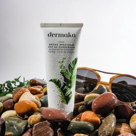 Dermaka tube with water droplets showing 80-minute water resistance