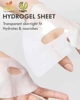 DERMAL mask held in hand for scale to show single-use size and coverage