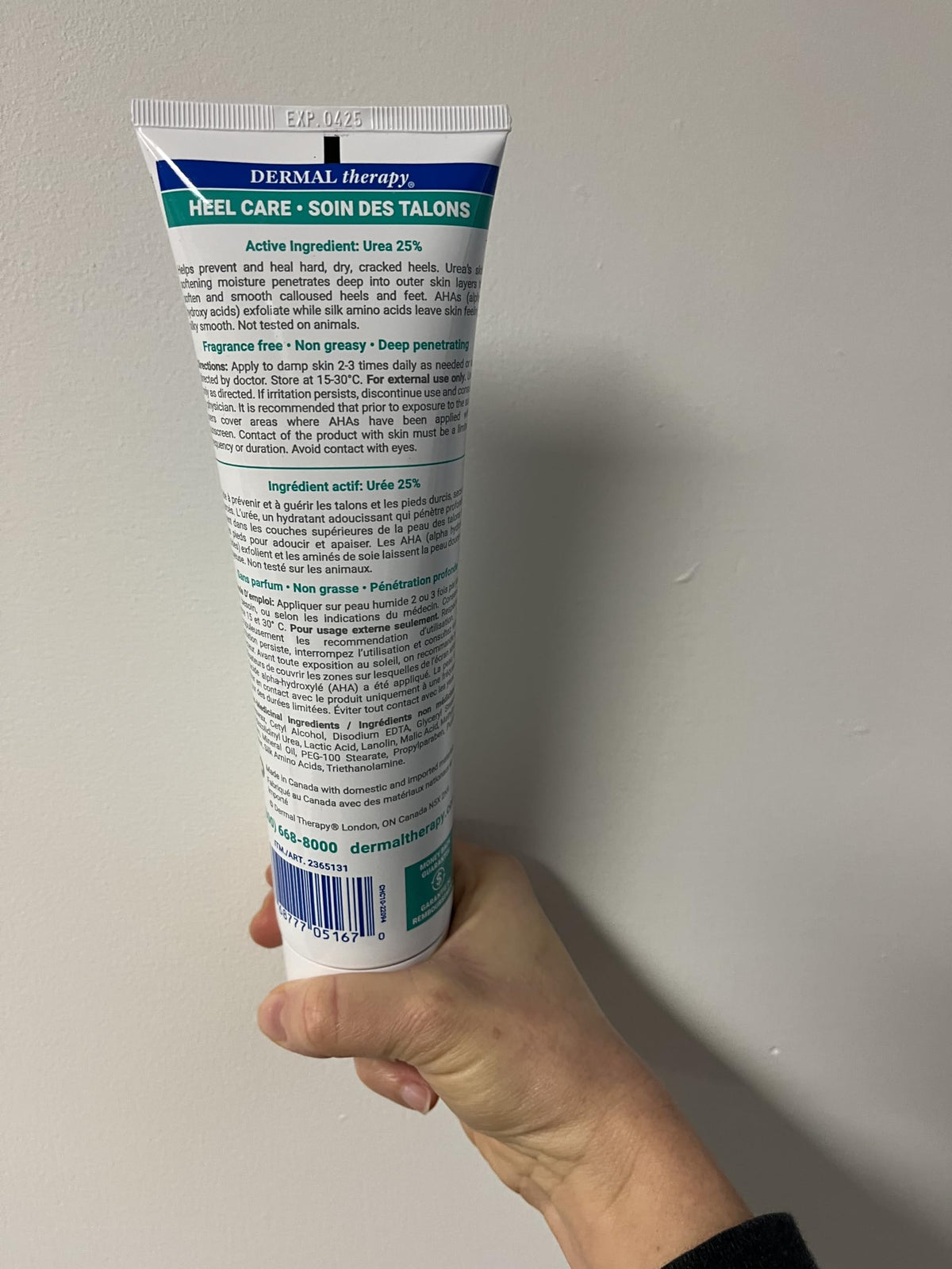 Dermal Therapy applying cream to heel to hydrate and reduce roughness effectively