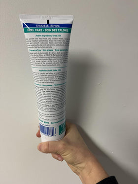 Dermal Therapy applying cream to heel to hydrate and reduce roughness effectively