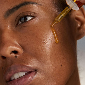 Dermalogica applying to face at night for overnight hydration